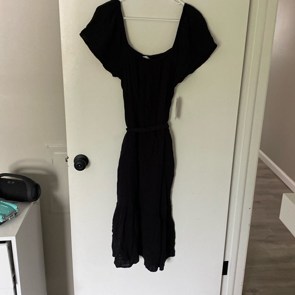 Cute off the shoulder, black mid length dress